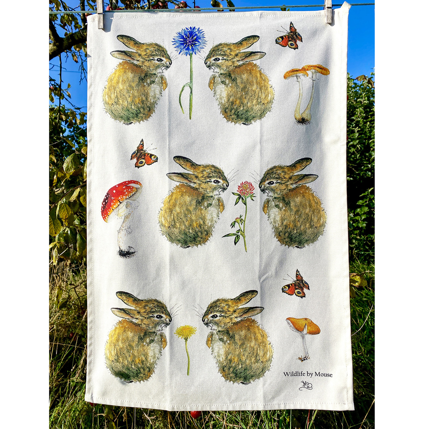 Baby bunny rabbit tea towel with wild flowers fungi and butterflies